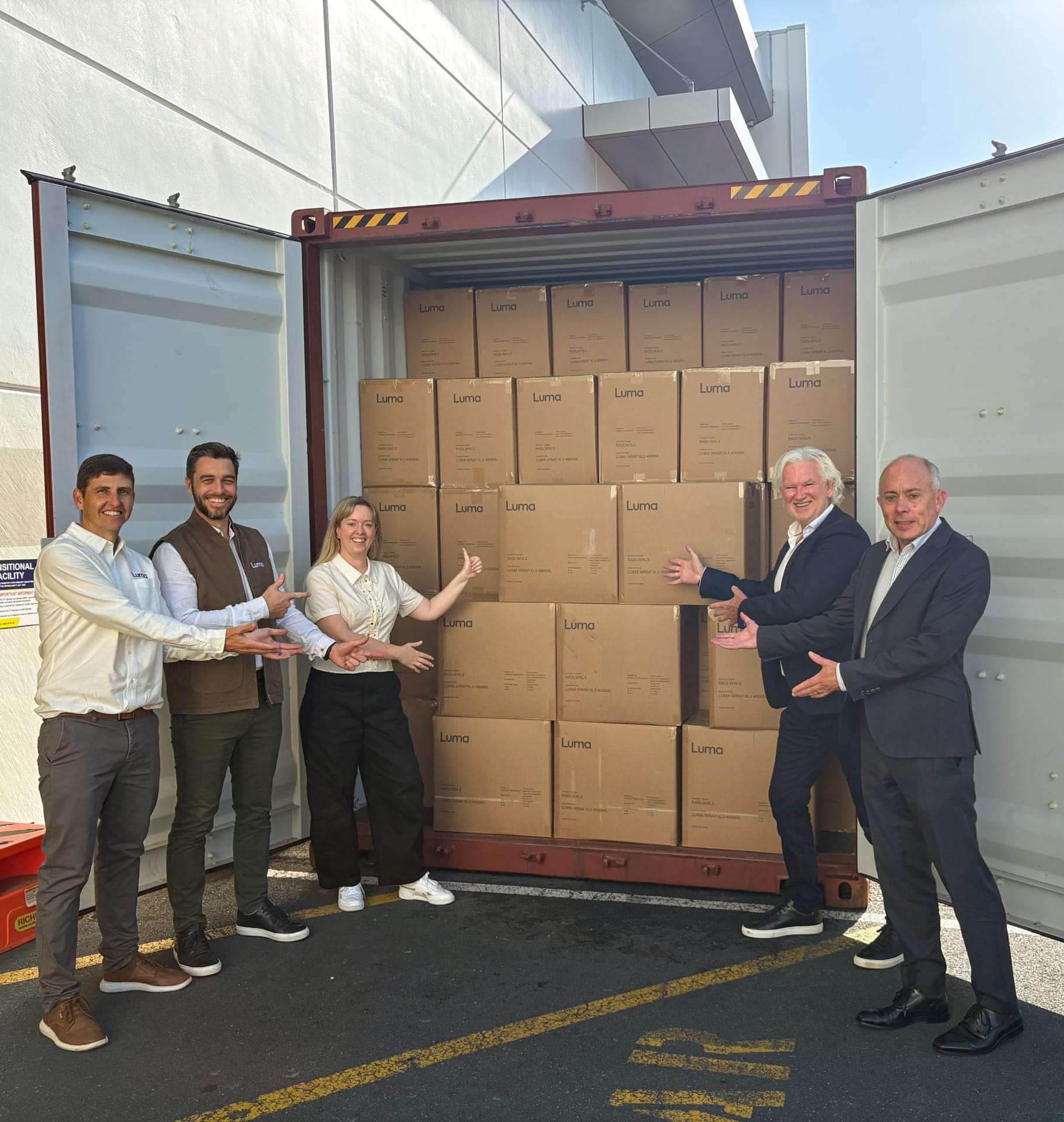James, Sam, Emma, Brien & Andrew with the first shipment of Luma products